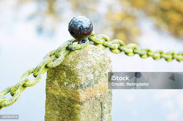 Knob On Stone Stock Photo - Download Image Now - Architectural Column, Black Color, Chain - Object