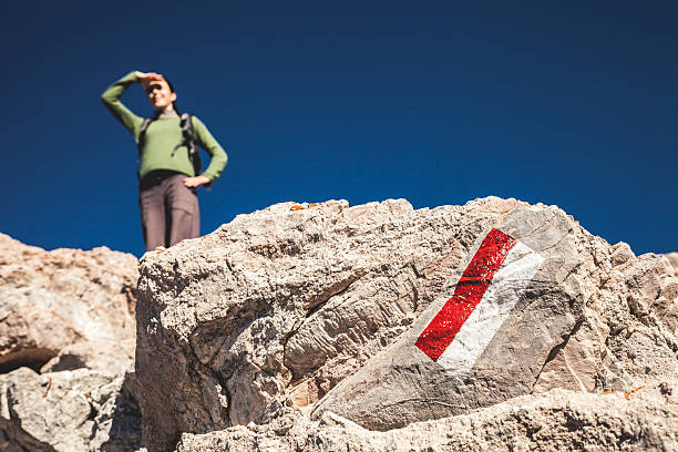 istock Woman on mountain peak 521344677