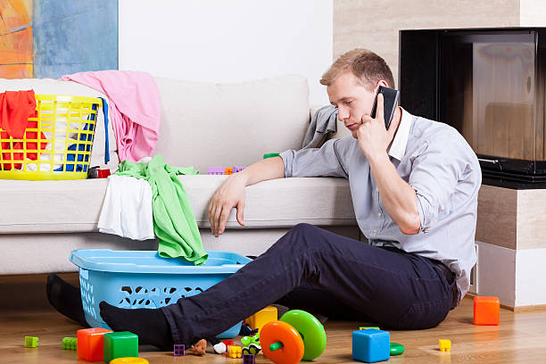 istock Man being alone at home with child 521346889