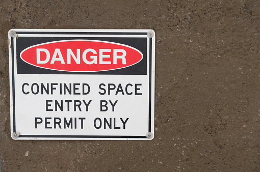 Loveland Pass, Colorado, USA-August 29,2022: Avalanche control blasting warning sign for back-country skiers. Loveland Pass, Colorado.