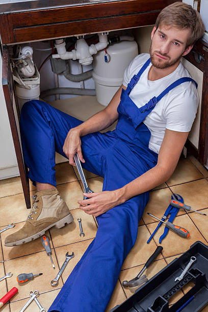 istock Tired man during sink repair 521347899