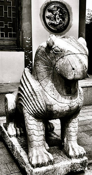 istock Mountain Lion Stone Statue Guarding Against Evil Spirits And Ghosts. 521365753