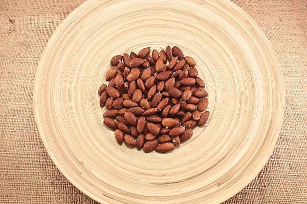 istock Salted Roasted Almonds Nuts, FoodLove2014 521366073