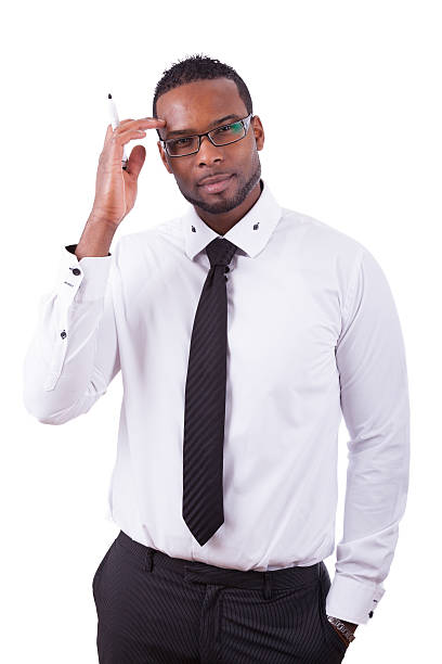 istock African american business man  writing something on glass board 521367809