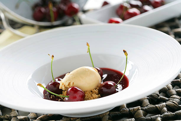 istock Cherry soup with caramel ice cream 521368757