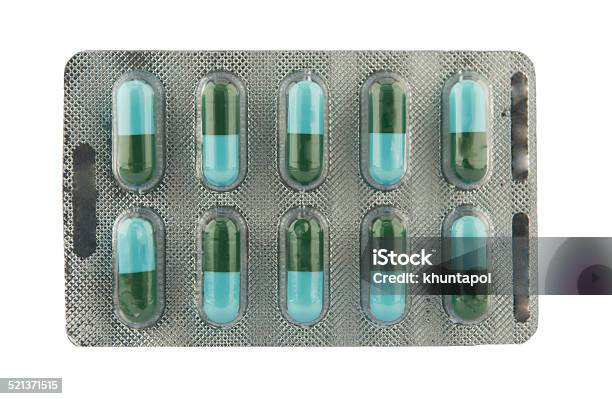 Green And Blue Capsule In Blister Pack Show Medicine Concept Stock Photo - Download Image Now