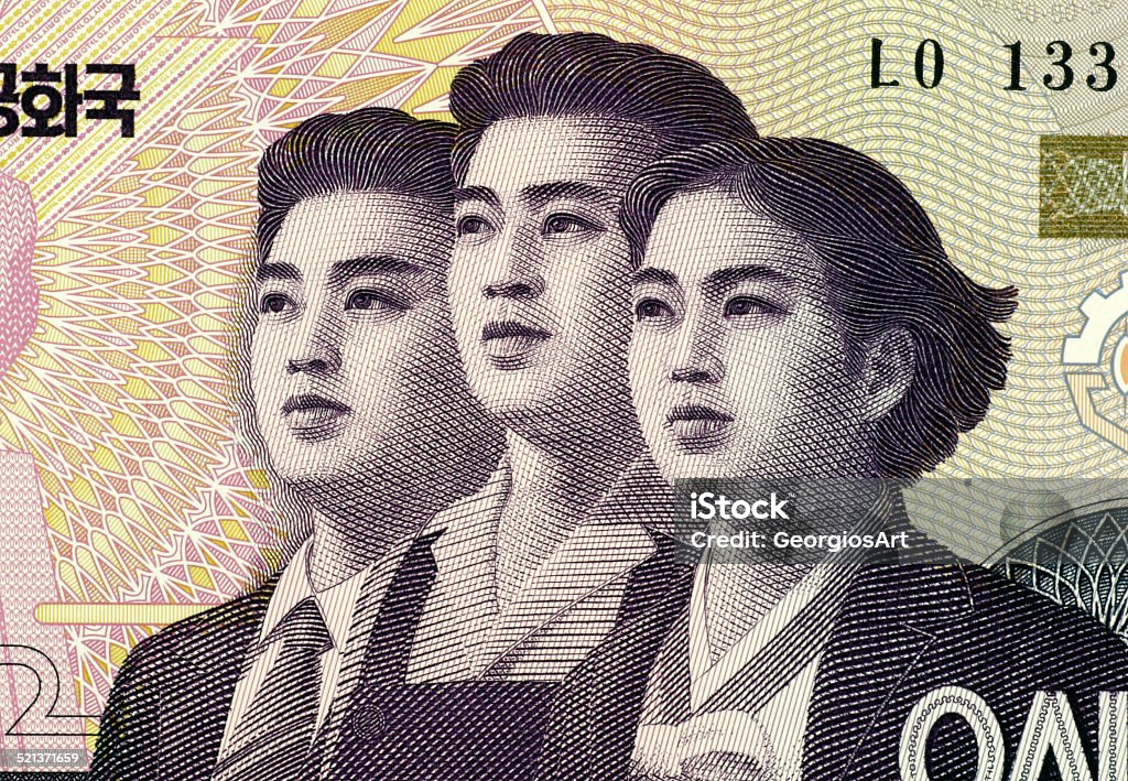 North Korean Young Professionals Young Professionals on 50 Won 2002 Banknote from North Korea. Less than 30% of the banknote is visible. North Korea Stock Photo