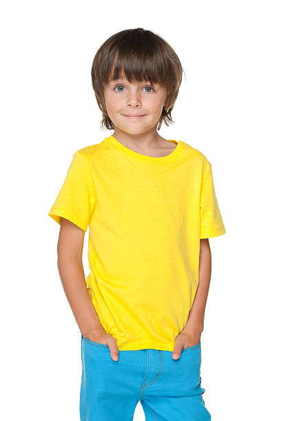 istock Cute little boy in a yellow shirt 521371953