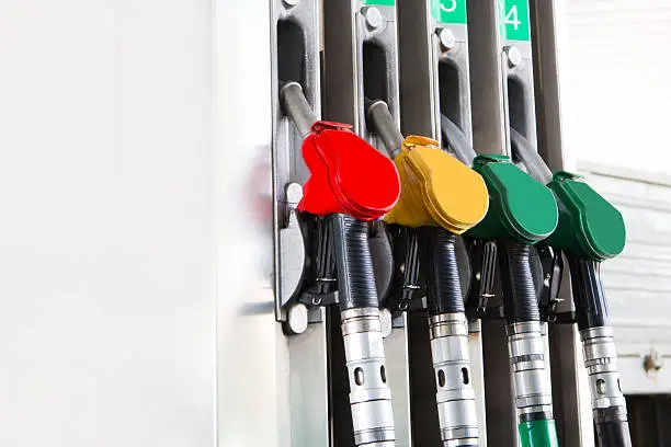 Detail fuel pump at auto gas station, close up, copy space