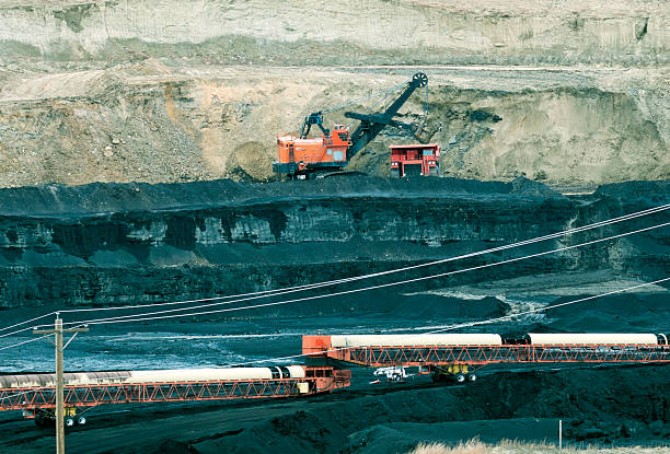 istock Crane removing soil at coal mine in Wyoming 521373028