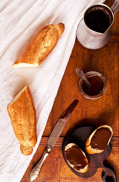 istock Breakfast appetizer with French baguette and coffee 521375696