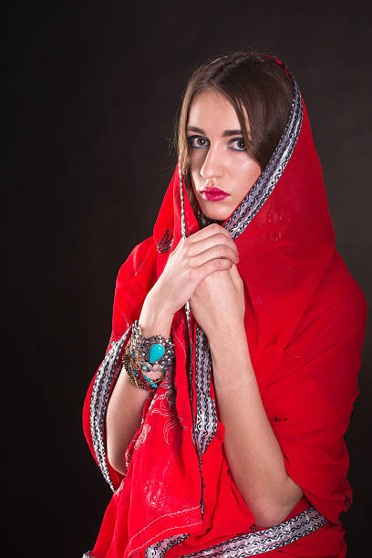 istock Woman in red sari 521376320