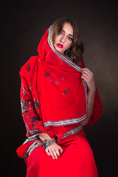 istock Woman in red sari 521376542