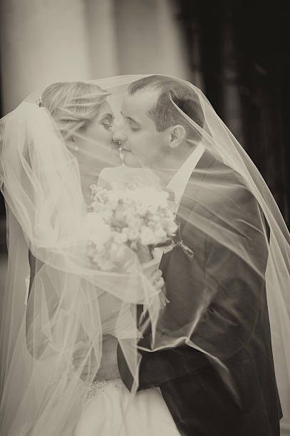istock Happy bride and groom on their wedding 521376680
