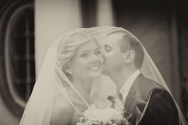 istock Happy bride and groom on their wedding 521376816