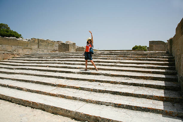istock tourist saluting in Festos ruins Crete 521380068
