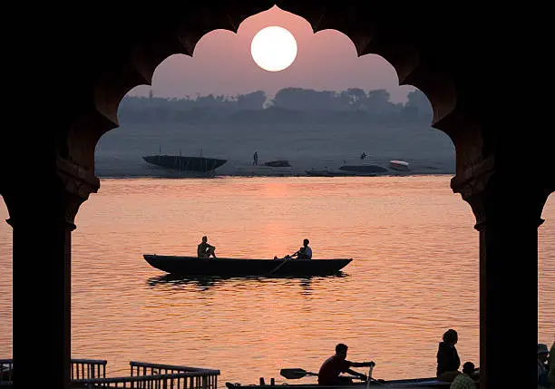 Sunrise over the Holy River Ganges in Varanasi in the Uttar Pradesh region of northern India