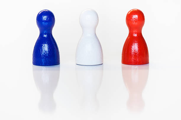 Blue, white, red toy figurines stock photo
