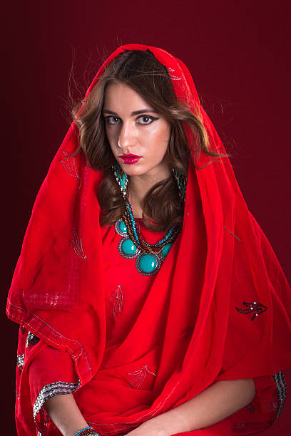 istock Woman in red sari 521381522
