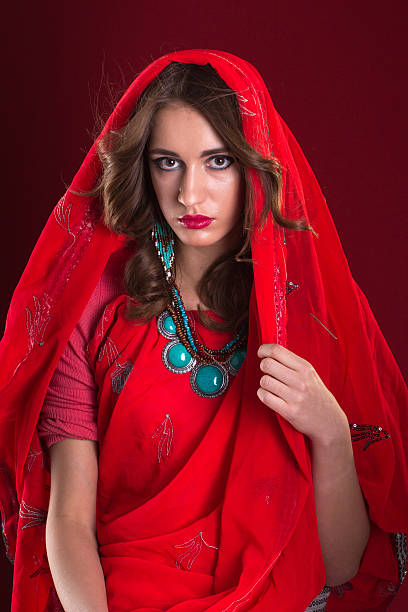 istock Woman in red sari 521381608