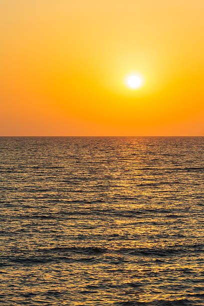 istock Colorful sunset over the sea 521383040