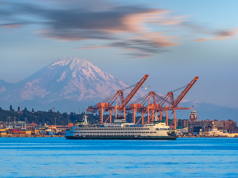 Seattle harbor with MT. Rainier in sunset, Seattle, WA, USA.