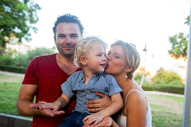 istock Affectionate family spending their day in the park. 521383770