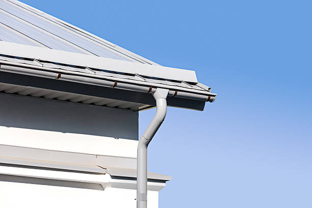 istock house corner with new rain gutter and downspout 521384244