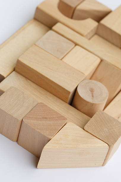 istock Wooden building blocks isolated on white background 521384521