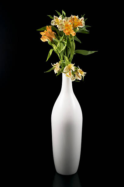 istock Flowers in a white elegant vase 521384902