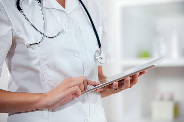 istock Female Doctor Using Digital Tablet In Hospital 521385409