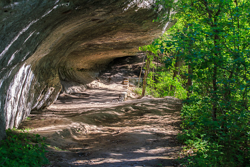 The smith Rock Shelter was used by Native Americans and can be seen from a trail in McKinney Falls State Park.
