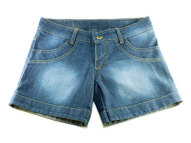 istock woman jean shorts on white background 521387248