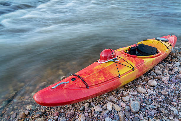 istock whitewater kayak with helmet 521387374