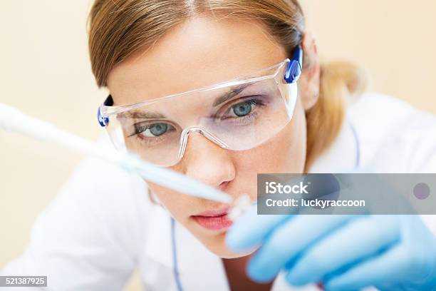 Young Scientist Working With Samples In Lab Stock Photo - Download Image Now - Adult, Adults Only, Analyzing