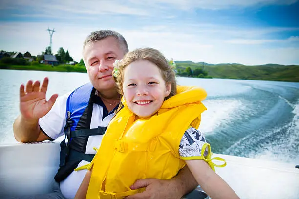 Photo of Travel of children on water in the boat