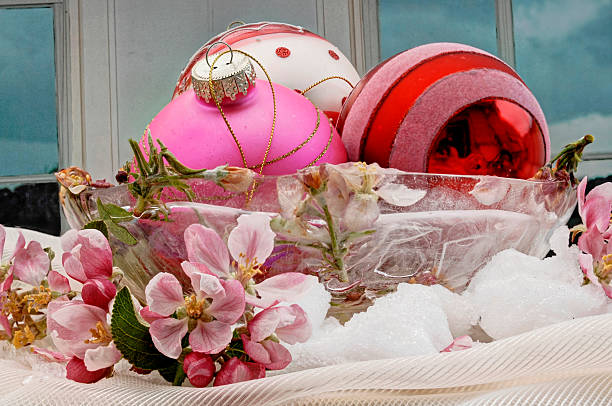 istock Christmas balls in ice cube tray with flowers 521401133