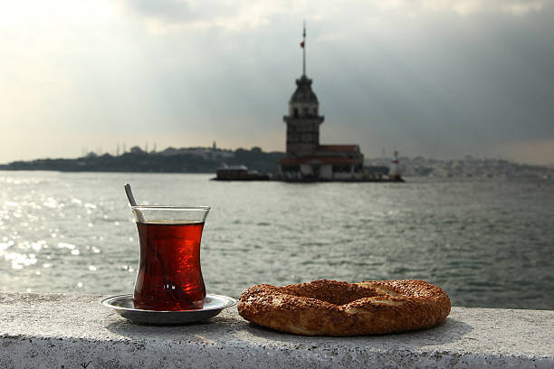 tea and simit tea and simit near the maiden tower maidens tower turkey photos stock pictures, royalty-free photos & images
