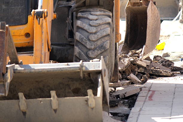 istock Excavation On Asphalt Road 521404147