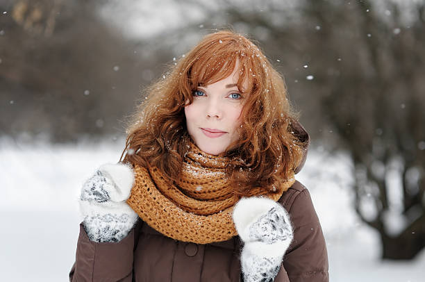 istock Young beautiful woman in winter 521405651