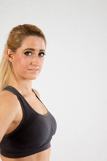 istock Blond woman in exercise outfit, smiling 521405833
