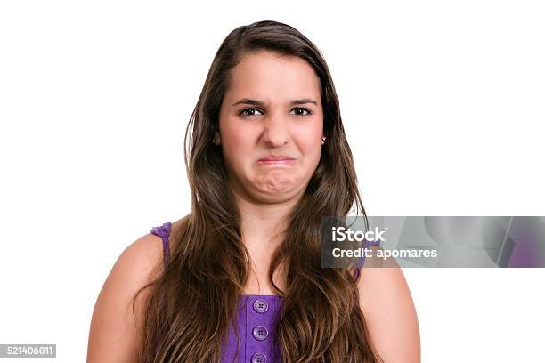 Disgunting And Unpleasant Smell Hispanic Young Woman Expression Series Stock Photo - Download Image Now