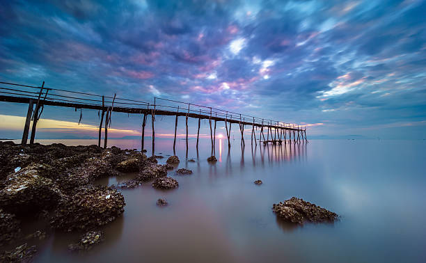 istock Sunrise on the wooden bridge 521415451