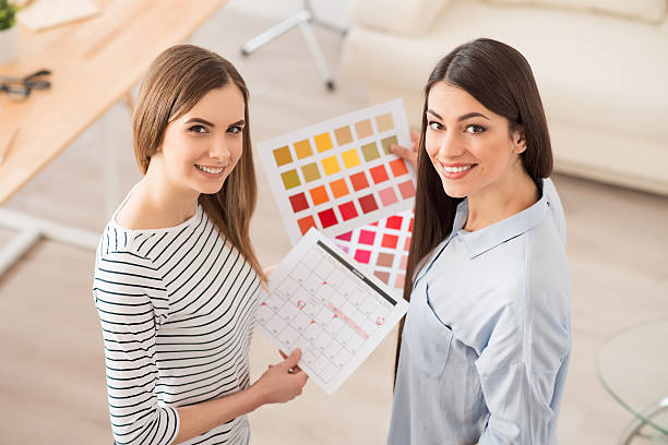 istock Positive girls standing in the office 521417140
