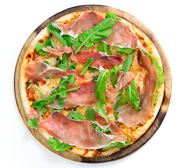 istock Pizza with dry cured ham Top view on white 521417763