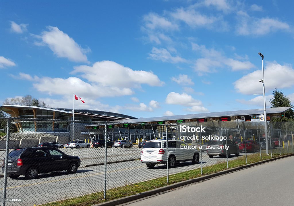 Canada BC Border Crossing After Leaving Blaine Washington White Rock,Canada- March 28,2016: Cars stopped at modern White Rock BC Canada Peach Arch border crossing.  Washington State USA to South for US Customs and border crossing.   Canada Stock Photo