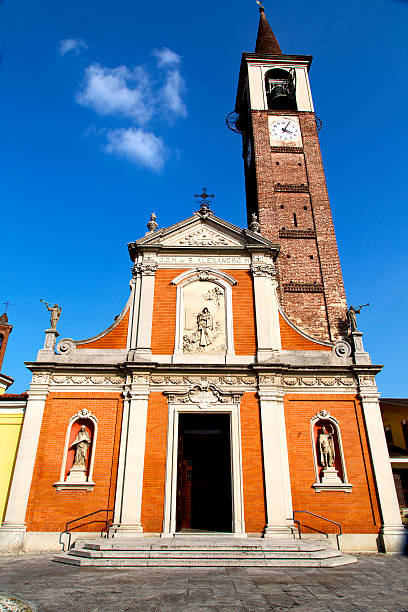 istock in  the mozzate  old   church  closed brick tower sidewalk italy 521418861