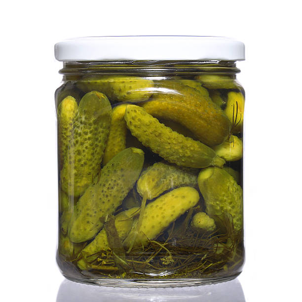istock Jar of pickles isolated over white 521419005