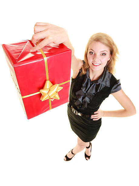 istock holidays love happiness concept - girl with gift box 521420879