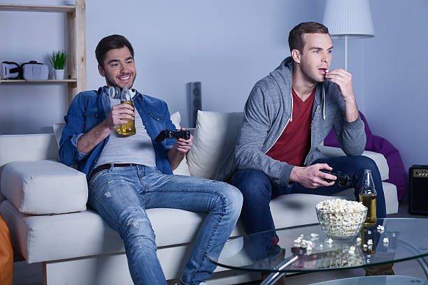 istock Handsome two friends are spending time for fun 521425042